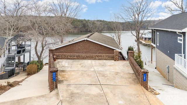 exterior space featuring a water view