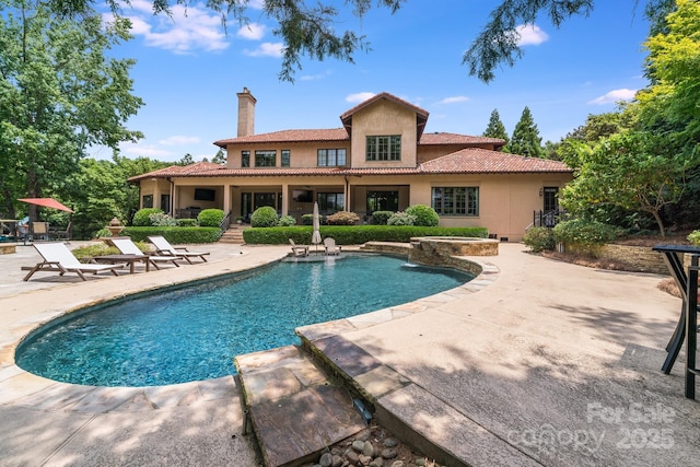 view of pool with a patio area