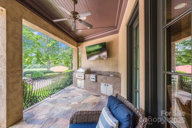 view of patio / terrace featuring ceiling fan, a balcony, area for grilling, and grilling area