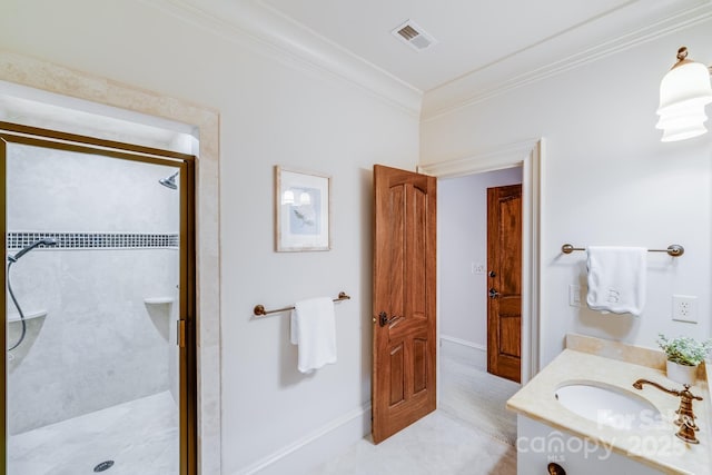 bathroom featuring crown molding, vanity, and walk in shower