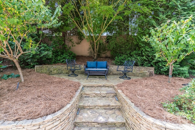 view of yard featuring an outdoor living space and a patio