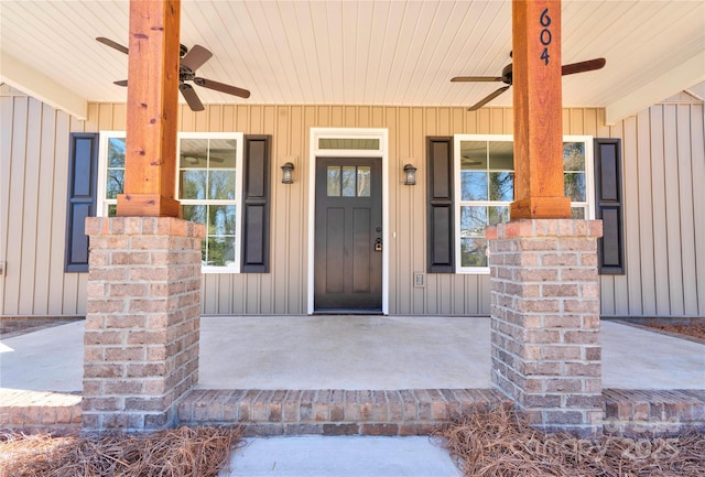 604 E Ridge St, Kings Mountain, NC 28086 - view of exterior entry featuring ceiling fan, board and batten siding, and a porch