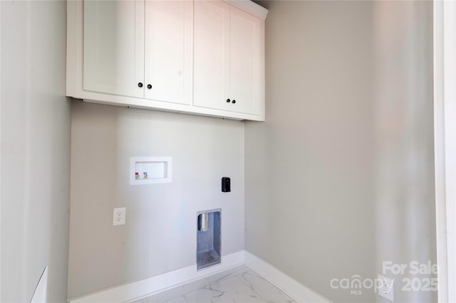 604 E Ridge St, Kings Mountain, NC 28086 - clothes washing area with washer hookup, hookup for an electric dryer, marble finish floor, baseboards, and cabinet space
