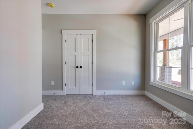604 E Ridge St, Kings Mountain, NC 28086 - carpeted empty room with baseboards