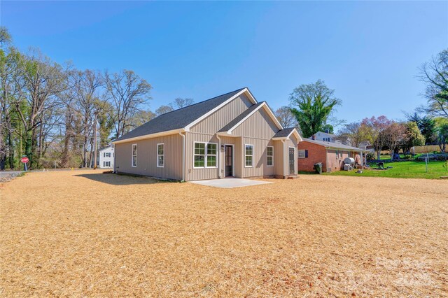 604 E Ridge St, Kings Mountain, NC 28086 - rear view of house with a patio and a yard