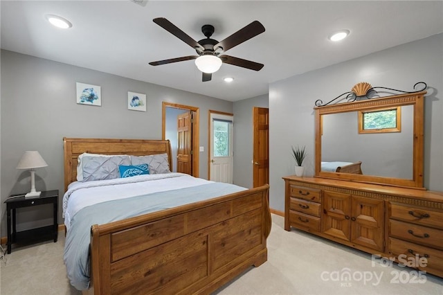 carpeted bedroom with ceiling fan