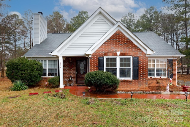 view of front of house with a front yard