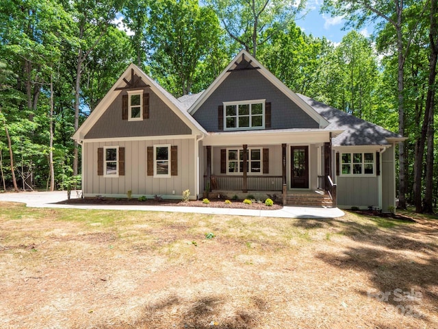 view of front of home with board and batten siding and a porch