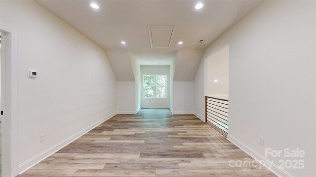 4607 Ferguson Cir, Waxhaw, NC 28173 - additional living space featuring recessed lighting, attic access, baseboards, light wood finished floors, and vaulted ceiling