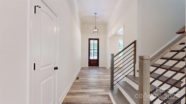 4607 Ferguson Cir, Waxhaw, NC 28173 - entryway with wood finished floors, baseboards, and stairs