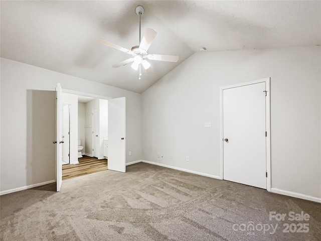 unfurnished bedroom with lofted ceiling, carpet floors, and ceiling fan