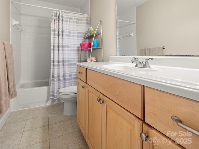 full bathroom featuring tile patterned flooring, vanity, toilet, and shower / bath combo