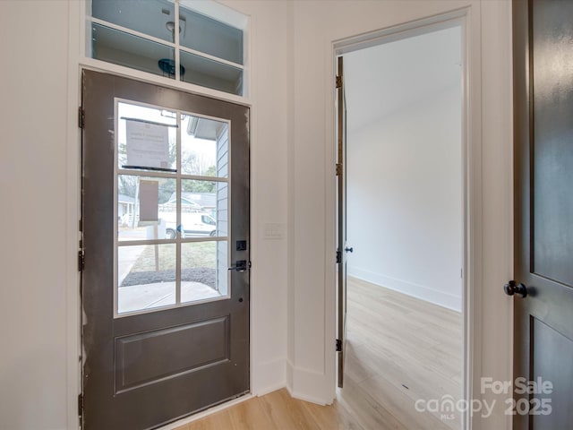 entryway with light wood-type flooring