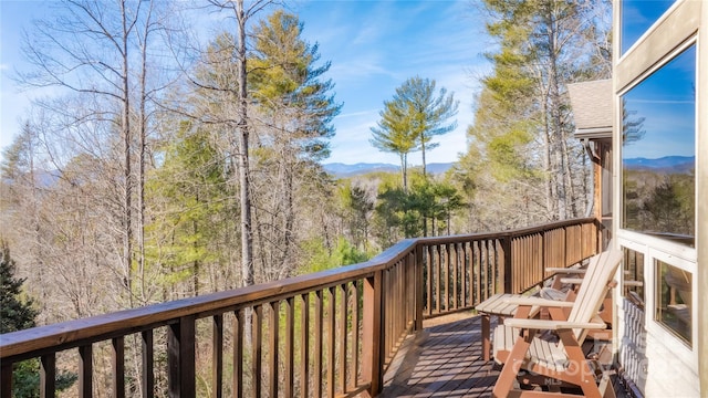 balcony with a deck with mountain view