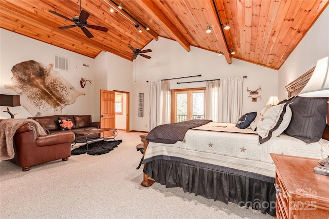 bedroom featuring beam ceiling, carpet flooring, access to exterior, and wood ceiling