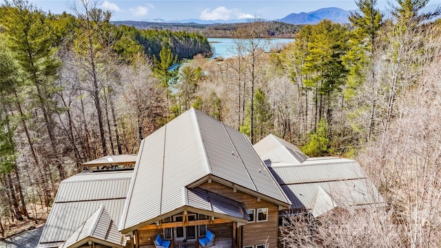 birds eye view of property featuring a mountain view