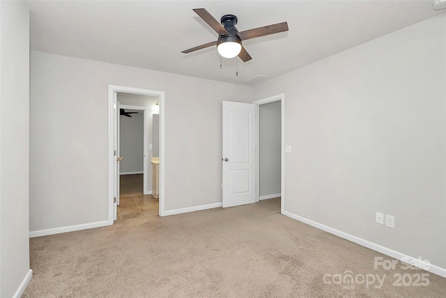 unfurnished bedroom with ceiling fan and light carpet