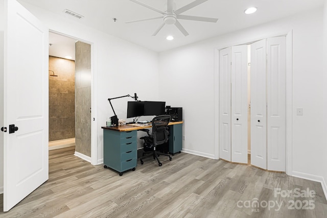 office area with ceiling fan and light wood-type flooring