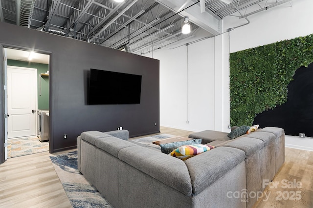 living room with light hardwood / wood-style floors