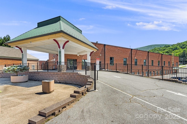 exterior space featuring a mountain view