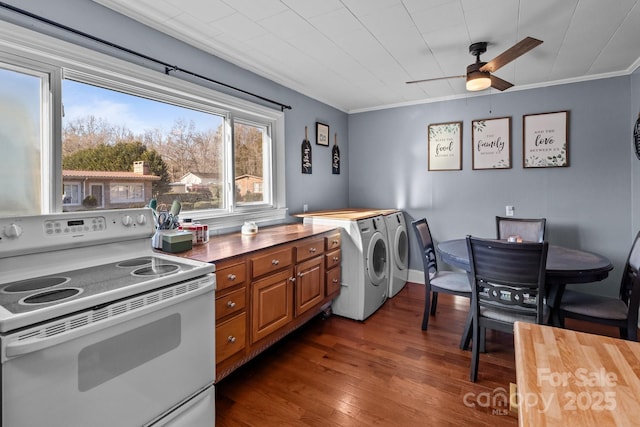 kitchen with butcher block countertops, dark wood-type flooring, ornamental molding, and white electric range oven