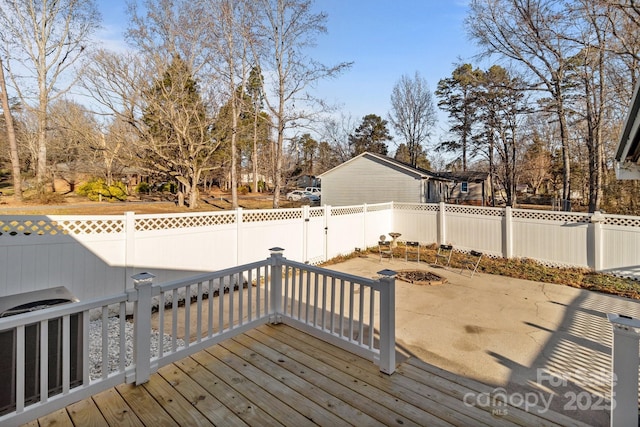 deck with central AC and a patio area