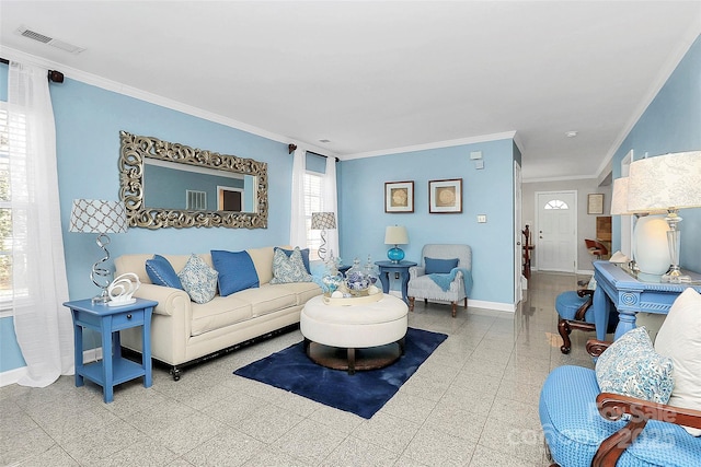 living room with ornamental molding