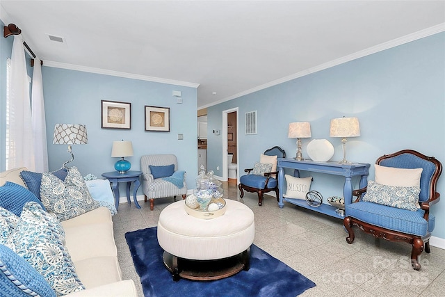 living room with ornamental molding