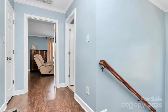 hall with crown molding and dark hardwood / wood-style floors