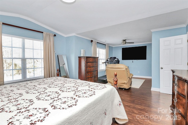 bedroom featuring crown molding, dark hardwood / wood-style flooring, and vaulted ceiling