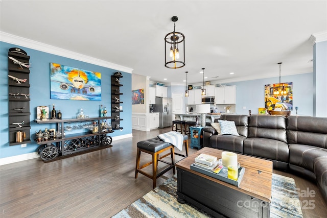 living room featuring dark wood-type flooring and ornamental molding