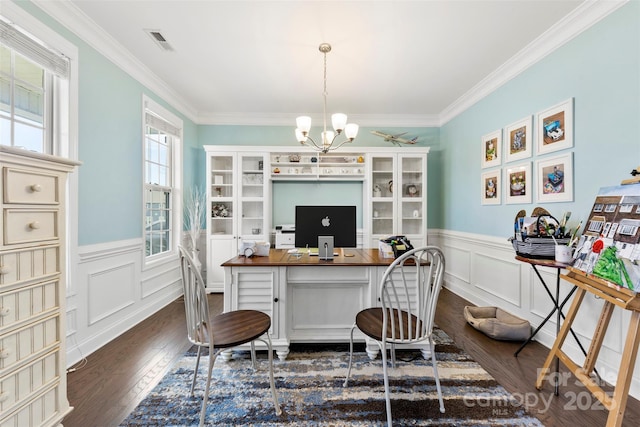 home office with dark hardwood / wood-style flooring, crown molding, and an inviting chandelier