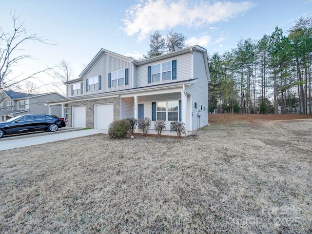 view of front of home with a porch and a garage