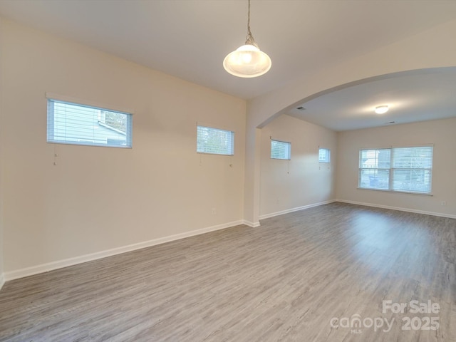 empty room featuring hardwood / wood-style floors