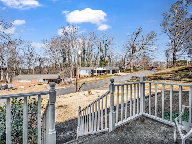 view of yard with covered porch