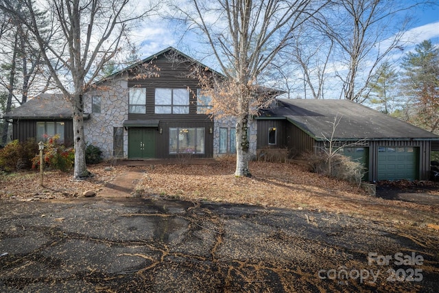 front of property with a garage