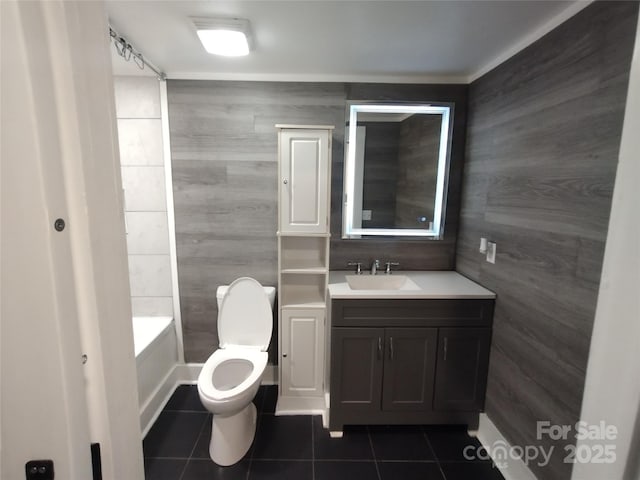 bathroom featuring tile patterned flooring, vanity, and toilet