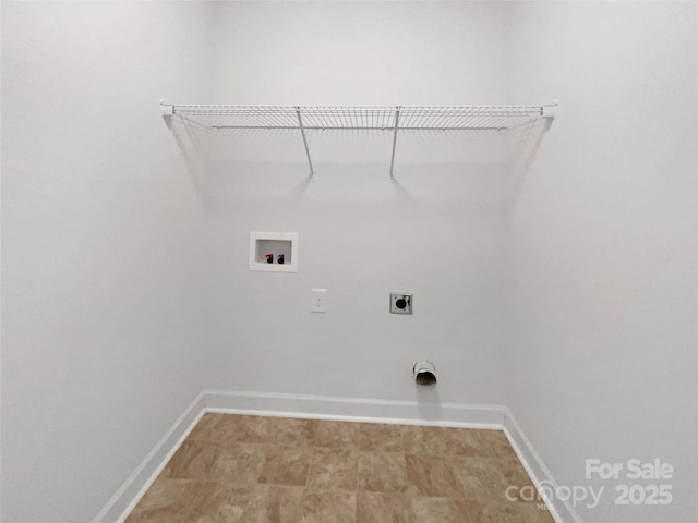 clothes washing area with washer hookup and electric dryer hookup