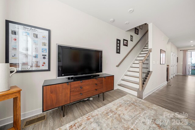 living room with wood-type flooring