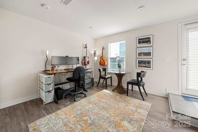 home office featuring hardwood / wood-style flooring