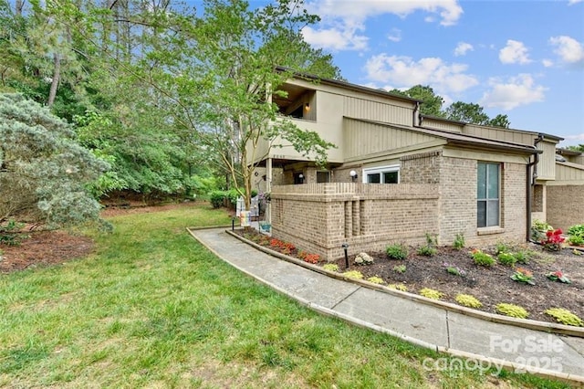 view of home's exterior featuring a lawn