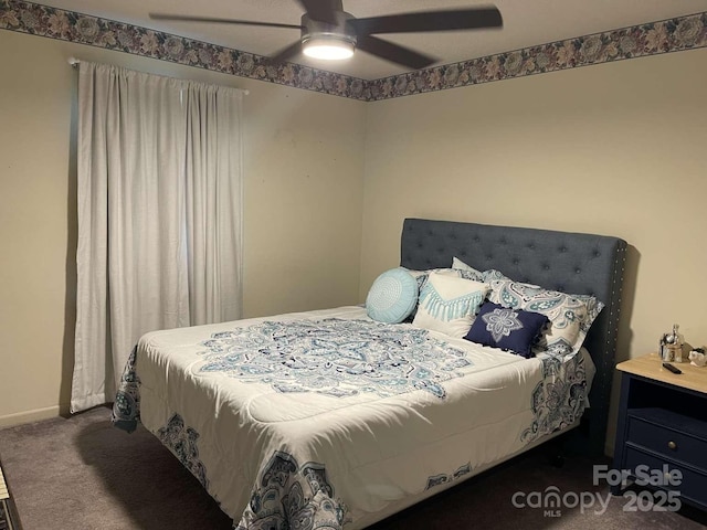 carpeted bedroom with ceiling fan