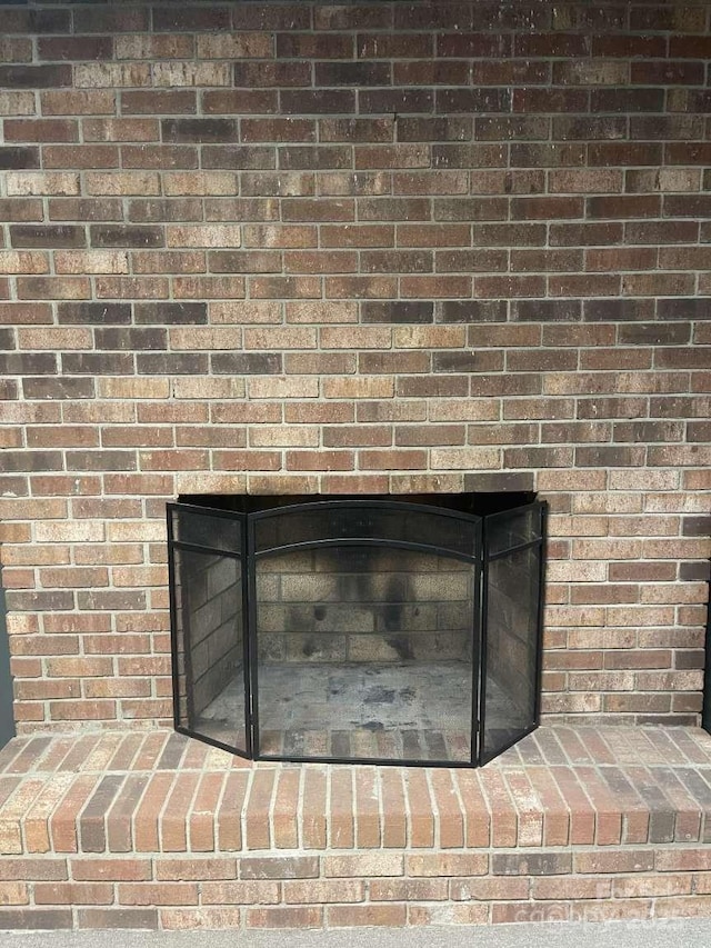 interior details with a fireplace