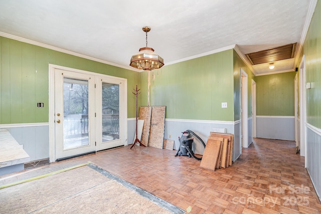 unfurnished dining area with visible vents and crown molding