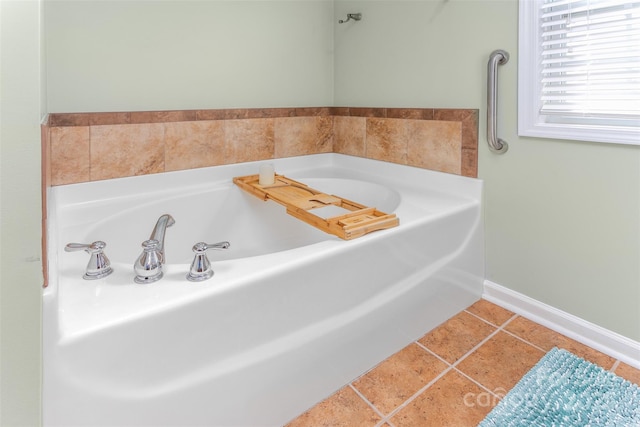 bathroom featuring tile patterned flooring and a bathtub