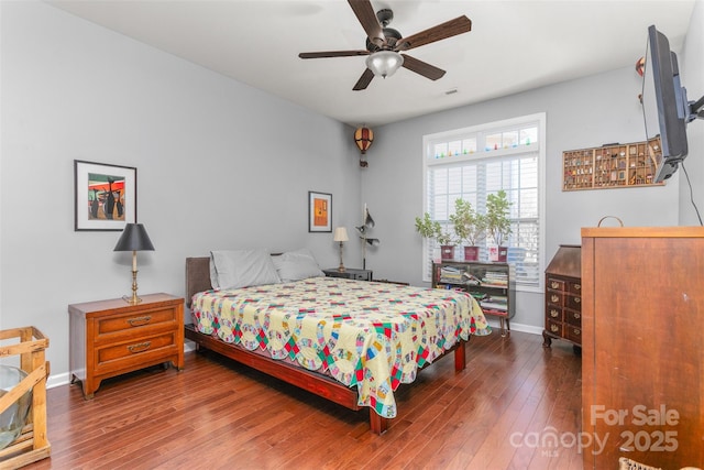 bedroom featuring ceiling fan and wood-type flooring