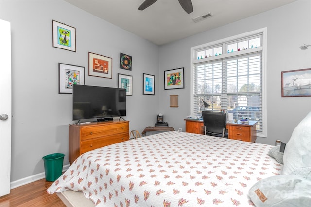 bedroom featuring ceiling fan and light wood-type flooring