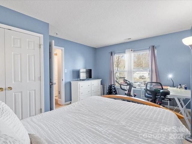 bedroom featuring a textured ceiling