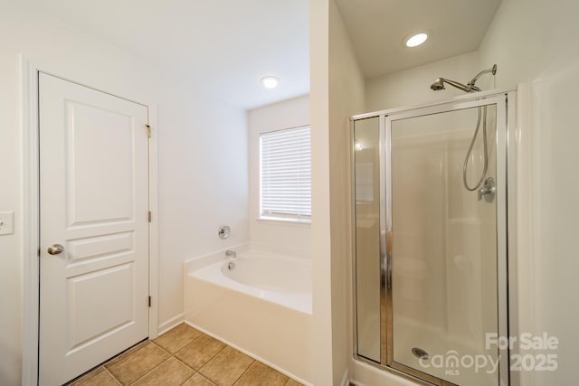 bathroom featuring separate shower and tub and tile patterned flooring