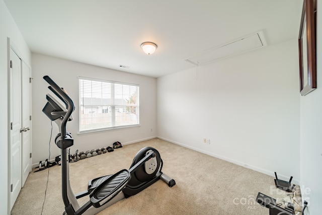 exercise room with light carpet